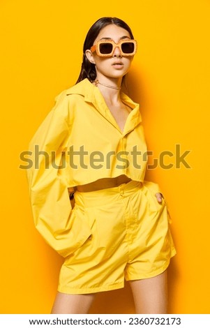 lifestyle woman sunglasses young fashion beautiful trendy yellow girl fun attractive