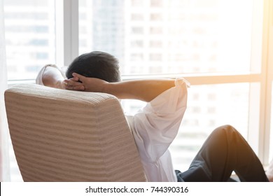 Life-work Balance And City Living Life Style Concept Of Business Man Relaxing, Take It Easy In Office Room Resting With Thoughtful Mind Thinking Of Lifestyle Quality Looking Forward To Urban Scene