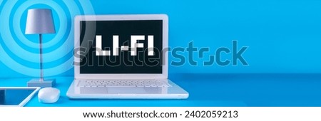 Li-Fi fast internet wireless connection concept, new lightening device, LED lamps energy-efficient data transmission communication technology. Unrecognizable person use smartphone tablet with Li-Fi
