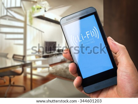 Li-Fi W-Lan technology, internet and networking concept - Young man activates Li-Fi High speed connection