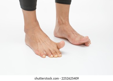 Lift big toe while keeping the other toes on the floor. Foot exercises for flexibility and mobility - Shutterstock ID 2252625409