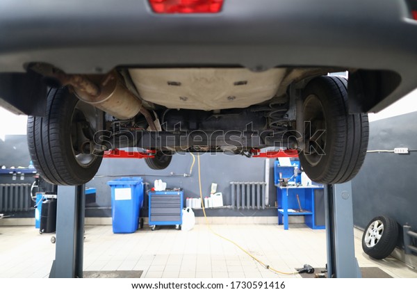 Lift\
car on lift for inspection car service center. Repair work is\
performed as needed. Checking original mileage car. Inspection body\
for defects and tints. Air conditioning\
diagnostics