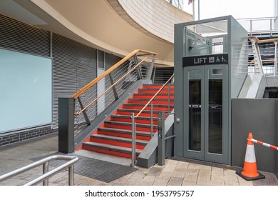 Lift For Disable People On The Street By Stair. Elevator For Wheel Chair Outdoor.