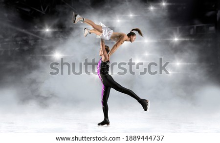 Lift. Duo figure skating in action on arena background. Sports banner