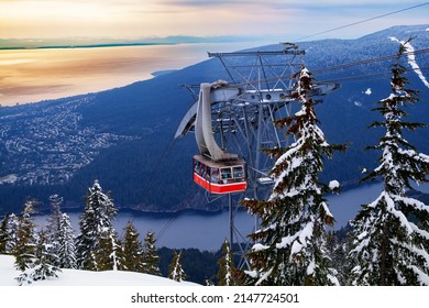 Lift Gondola Cabin Over Vancouver Panama And Capilano Lake From Grouse Grind In Canada At Winter