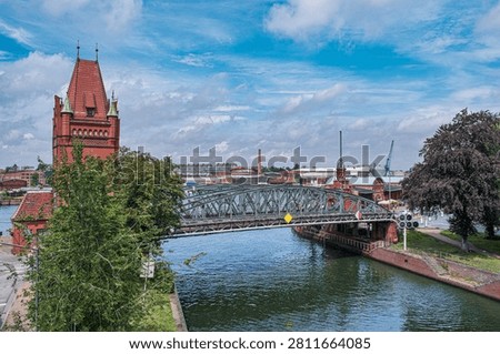 The lifting bridge, actually called the Marstall Bridge, over the Trave River near the Burgtor gate in the old town of Lübeck.