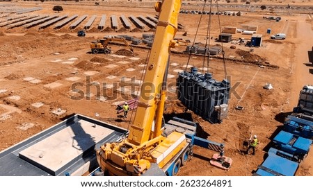 Lifting process for the assembly of electrical transformers in solar panel fields