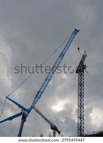 lifting process of pre-assembled tower crane elements with giant auto crane