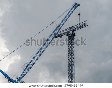 lifting process of pre-assembled tower crane elements with giant auto crane