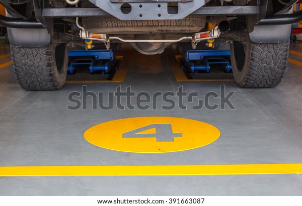 lifts\
maintenance vehicles maintenance car in\
garage