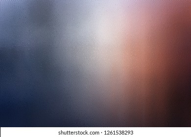 Light Abstraction On Corrugated Glass In The Form Of A Beautiful Bokeh. Reflex Glass. Carbon Texture.