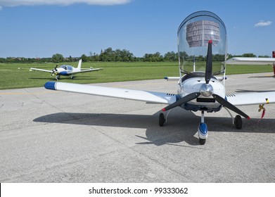 Light Aircraft Parked With Opened Canopy