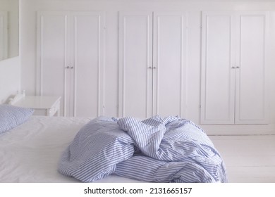 Light and airy dreamy totally white bedrom with white and blue striped bedlinen lovely summer sleep perfect for good deep night sleep, scandinavian, rest, peaceful,  less is more, minimalism