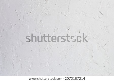 light background with texture of concrete, space for text 