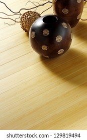 Light Bamboo Floor With Wooden Ornaments