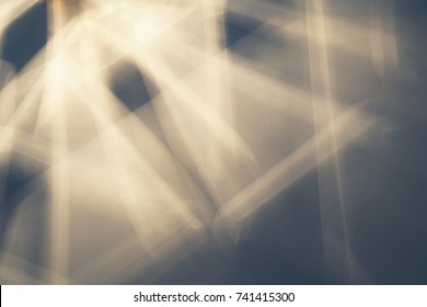 Light beams and shadows pattern over ceiling. Abstract background photo