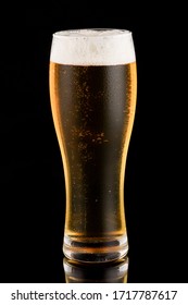 Light Beer In A Glass On Black Background