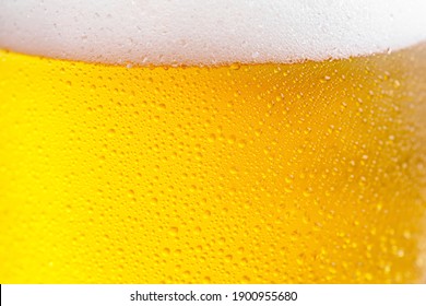 Light Beer In A Glass, On An Old Background.