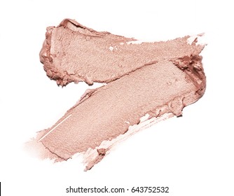 Light Beige Smear Of Crushed Highlighter Or Luminizer Isolated On White Background. Makeup Smear Of Creamy Foundation Isolated On White Background. Creamy Foundation Texture