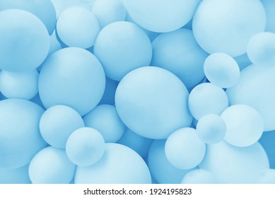 Light Blue balloons background, punchy pastel colored and soft focus. Party festive balloons photo wall birthday decoration for children. Background for wedding, anniversary, birthday.