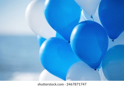 Light Blue balloons background, punchy pastel colored and soft focus. Party festive balloons photo wall birthday decoration for children. Background for wedding, anniversary, birthday. - Powered by Shutterstock