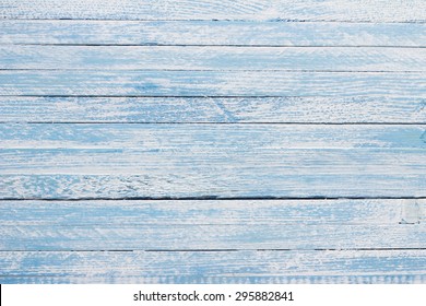 Light blue colored wooden background - Shutterstock ID 295882841