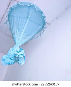 Light blue colour mosquito net - Shutterstock ID 2255243139