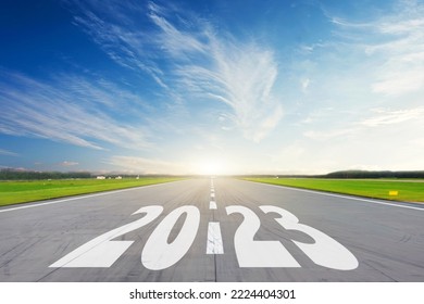Light blue daytime sky and the inscription on the road 2023. The concept of a bright future, new plans and ideas - Shutterstock ID 2224404301