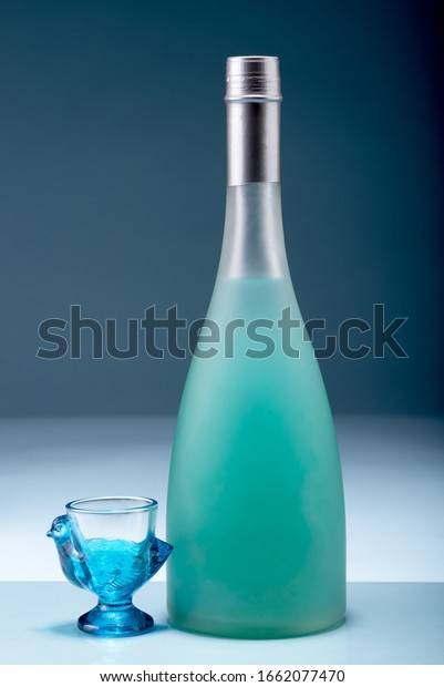 light blue liquor bottles