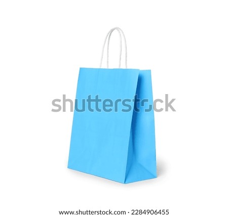 Light blue gift paper bag on white background