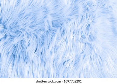 Light Blue Long Fiber Soft Fur. Blue Fur For Background Or Texture. Fuzzy Blue Fur Plaid. Shaggy Blanket Background. Fluffy Fake Textile Fur. Flat Lay, Top View, Copy Space