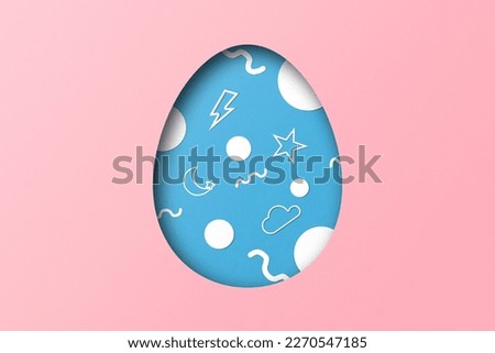 Light blue and pink paper cuts form an Easter egg pattern. overlay paper