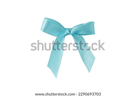 Light blue satin silk ribbon tied bow isolated on white