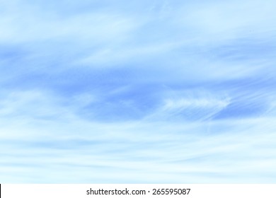 Light blue sky with cirrus clouds - abstract background
