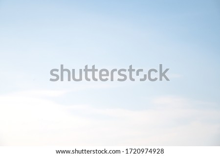 
Light blue sky and white clouds background.