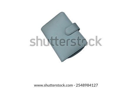 A light blue, small, rectangular notebook.