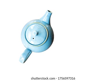 Light blue speckled retro teapot from above