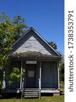 Light blue, wooden building houses the Black History Museum at Historic Washington State Park in Washington, Arkansas.