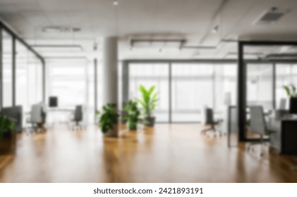 Light blur Minimalist Open Space Office background. Blurred Modern contemporary office and meeting room, interior design. with panoramic glass windows and green plant inside and Wooden floor - Powered by Shutterstock