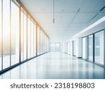 Light blurred background. The hall of an office or medical institution with panoramic windows and a perspective.  