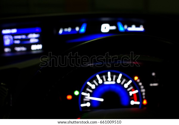 Light blurry car\'s\
dashboard