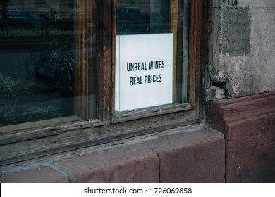 A Light Box With Advertising Phrase In A Window Of Cafe .  Letter Board . Wine.