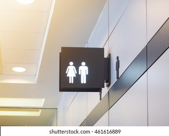 Light Box Of Public Restroom Sign On The Top Of The Entrance.