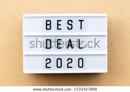 Light box with word best deal 2020 on wood background