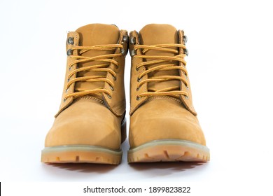 
Light brown leather shoes on a white background - Shutterstock ID 1899823822