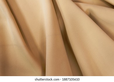 Light Brown Lycra Fabric In Soft Fold.