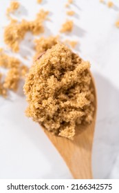 Light Brown Sugar On A Marble Counter Top.