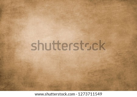 Light brown vignetted scratched background texture 
