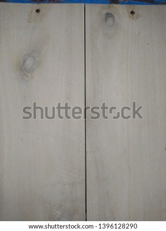 Light brown wooden planks, wall, table, ceiling or floor surface. Wood texture 