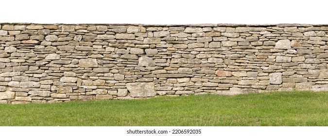 Light Brown Yellow Dry Stone Wall Texture,  Sloping Ground With Grass At The Bottom, White Cutout Sky, Sandstone Garden Wall Background